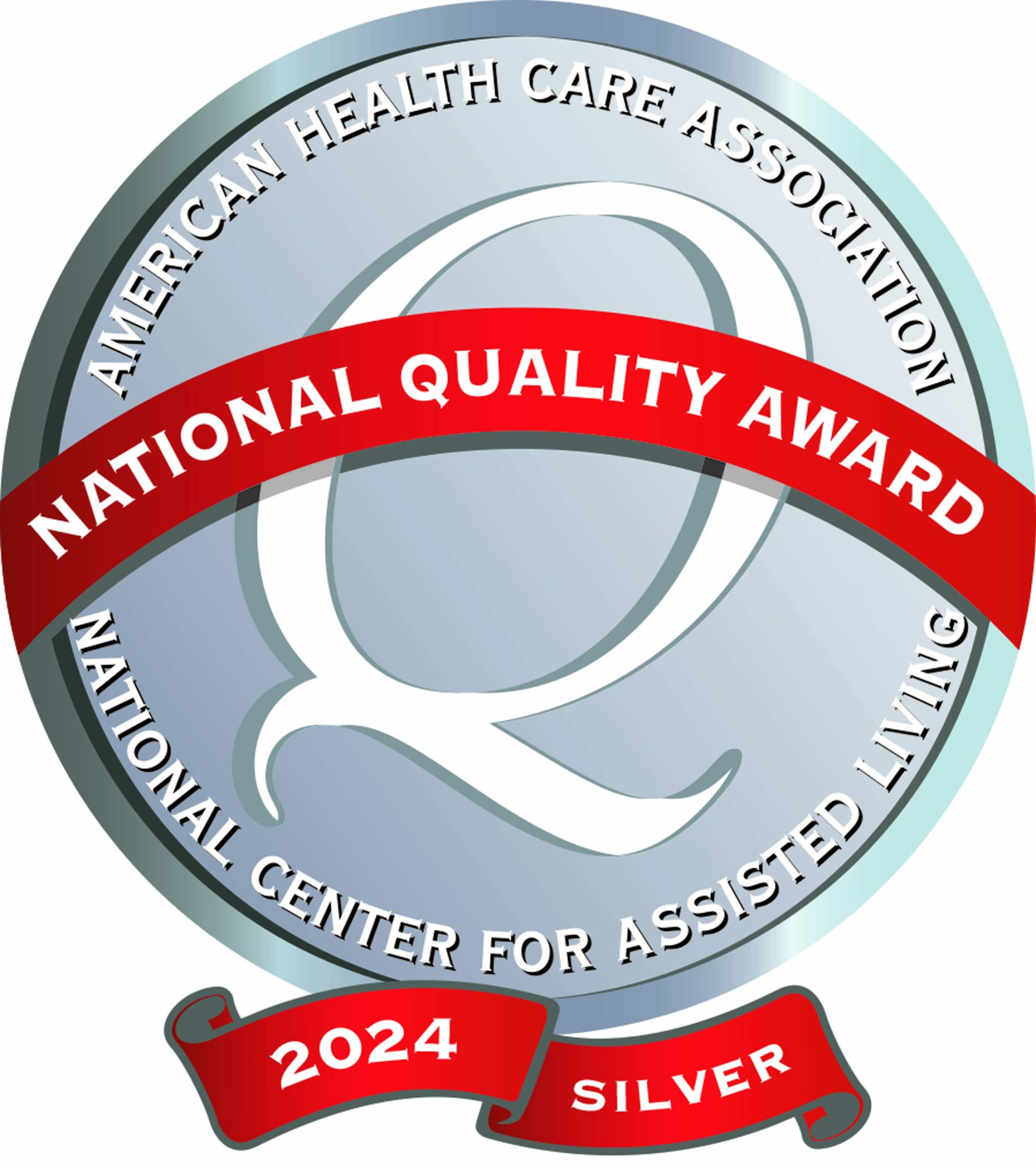 The 2024 Silver National Quality Award badge from the American Health Care Association and National Center for Assisted Living features a large Q and a red banner, symbolizing excellence in Care Initiative.