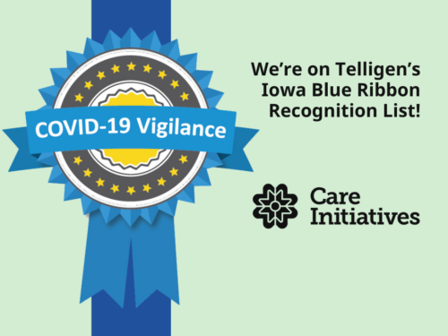 Certainly! Here is a description of the image you can visualize: --- A Blue Ribbon Badge: - The badge is circular with a vibrant blue color. - In its center, the text reads: COVID-19 Vigilance. --- Text Beside the Badge: - The text states: We're on Telligen’s Iowa Blue Ribbon Recognition List! --- Logo for Care Initiatives: Below this text, you would find: - The logo for Care Initiatives displayed prominently. The entire design presents a sense of achievement and recognition for maintaining vigilance against COVID-19.